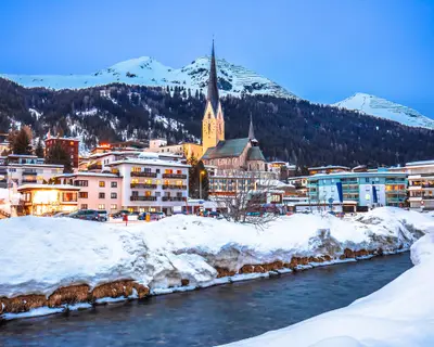 Idyllic mountain town of Davos in Swiss Alps evening view, luxury ski destination of Switzerland