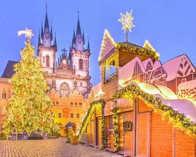 Christmas tree and fairy tale Church of our Lady Tyn in Prague, Czech Republic.