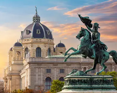 Statue of Archduke Charles on Heldenplatz square and Museum of Natural History dome, Vienna, Austria