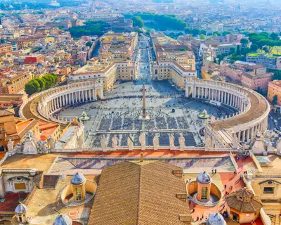Famous Saint Peter's Square in Vatican and aerial view of the Rome city during sunny day