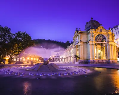 Small Bohemian spa town Marianske Lazne (Marienbad) with main colonnade with Singing fountain.