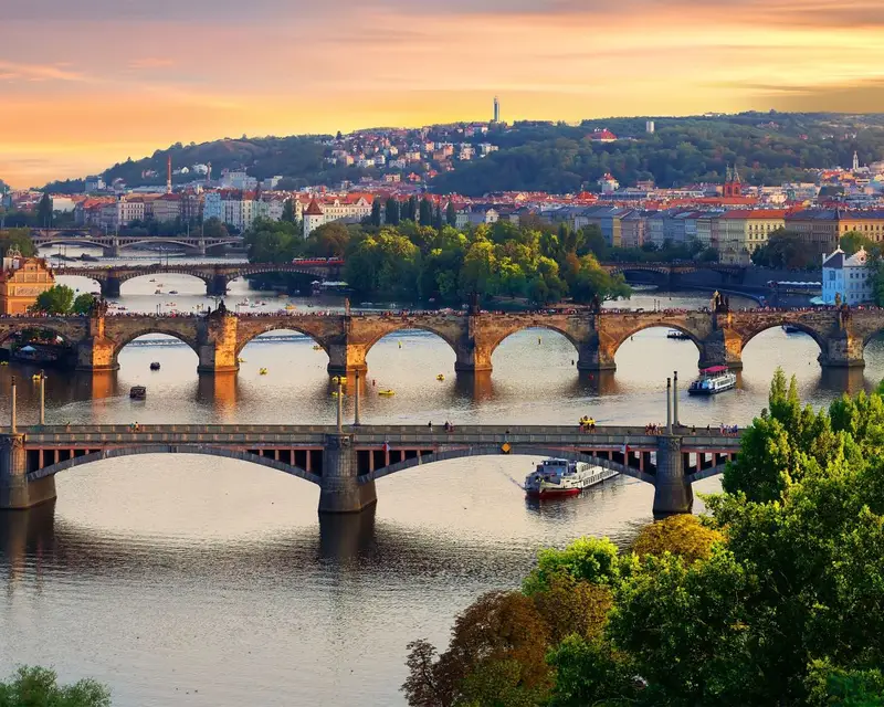 Overview of old Prague with Charles bridge at sunset