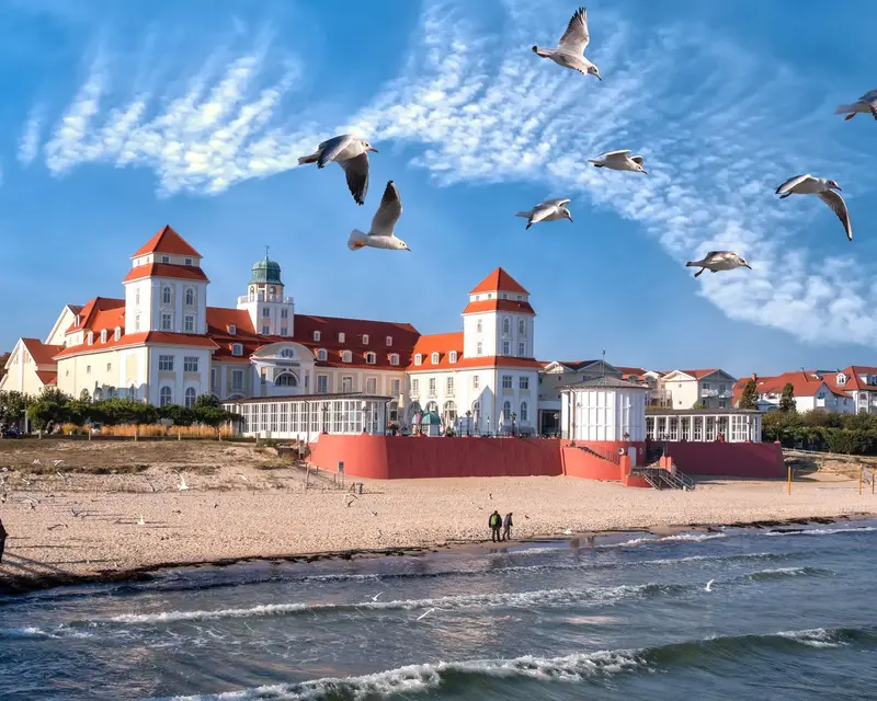 Beach promenade of Rügen-Binz on a sunny day with spa house in the background